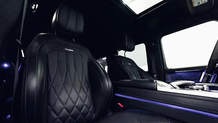 Black on black Mercedes Benz G63 AMG G Wagon rental interior view - mph club