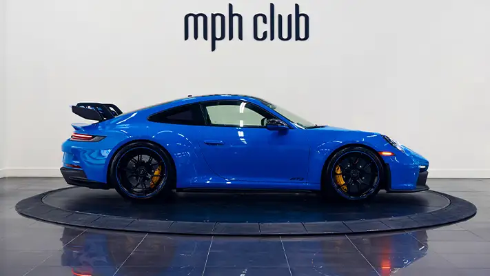 Blue Porsche 911 GT3 rental side view - mph club