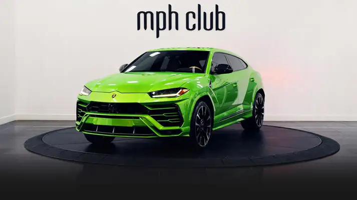 Green on brown Lamborghini Urus rental profile view rszd - mph club