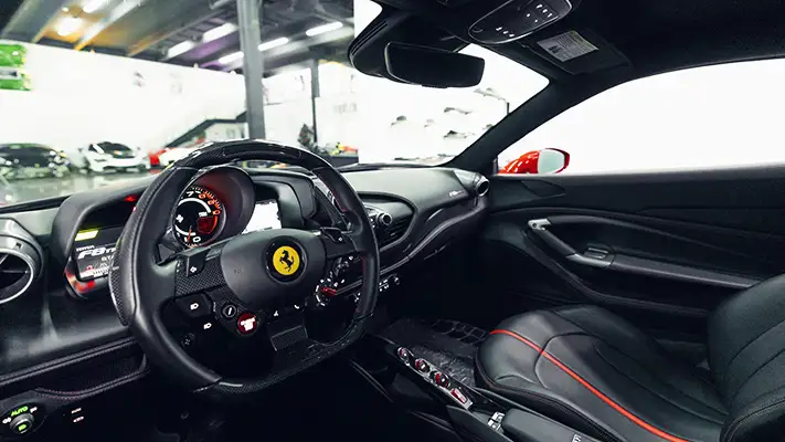 Red Ferrari F8 Coupe rental dashboard view - mph club