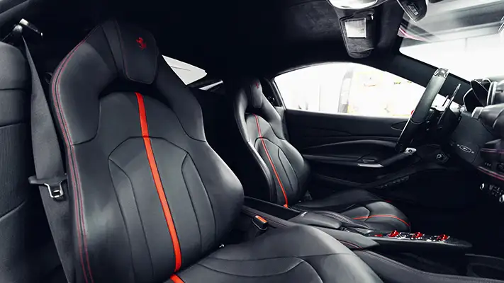 Red Ferrari F8 Coupe rental interior view - mph club