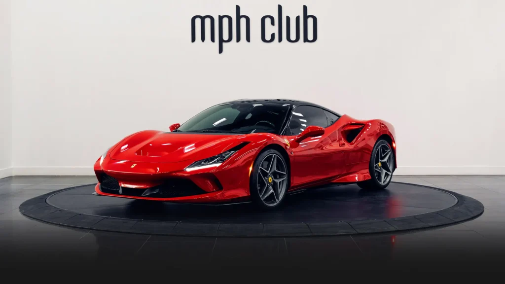 Red Ferrari F8 Coupe rental profile view - mph club