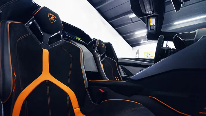 Blue Lamborghini Aventador SV Roadster rental interior view - mph club