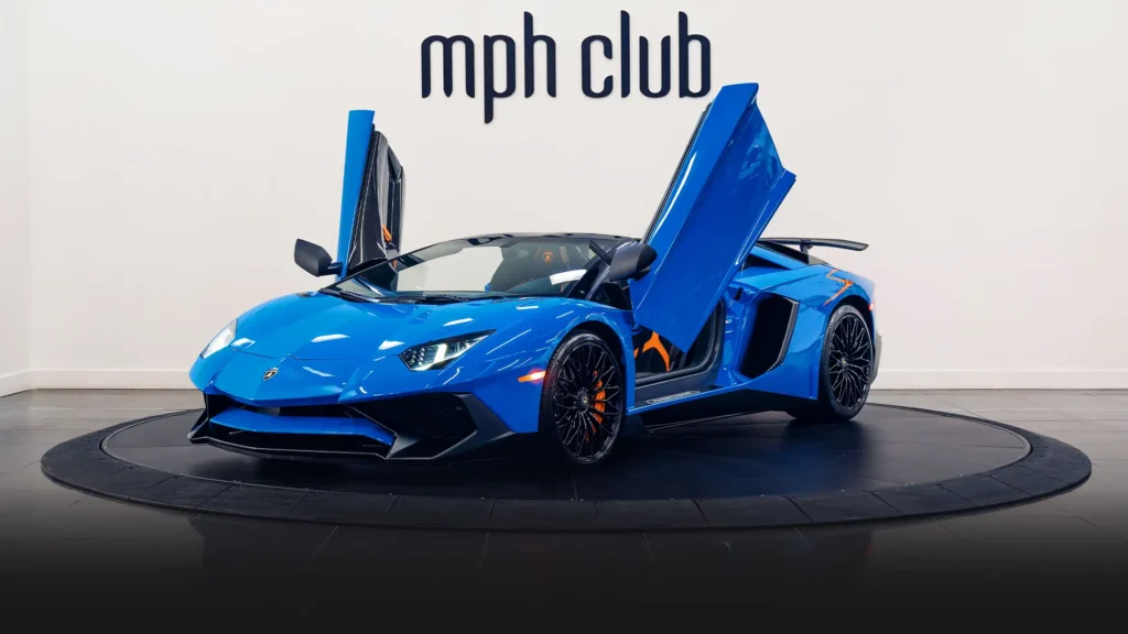 Blue Lamborghini Aventador SV Roadster rental profile view - mph club