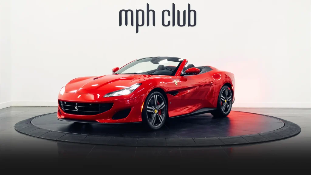 Red on black Ferrari Portofino rental profile view - mph club