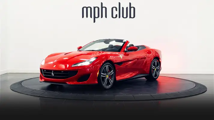 Red on black Ferrari Portofino rental profile view rszd - mph club