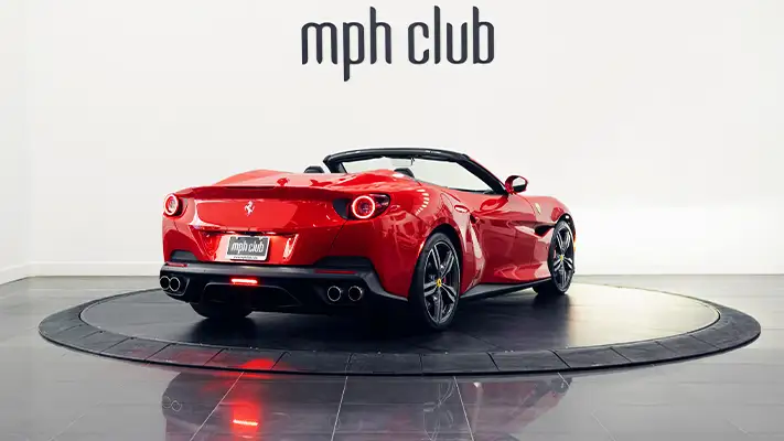 Red on black Ferrari Portofino rental rear view - mph club