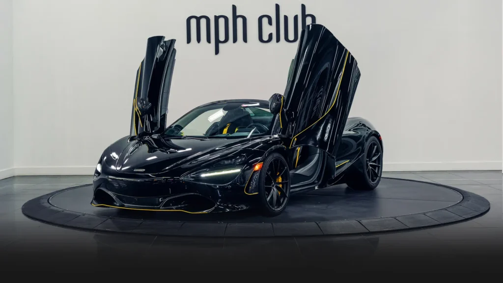 Black on yellow McLaren 720s Spider rental profile view - mph club