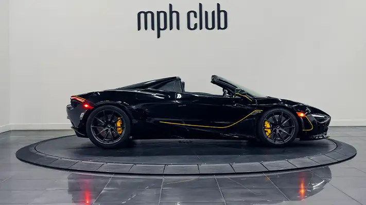 Black on yellow McLaren 720s Spider rental side view - mph club