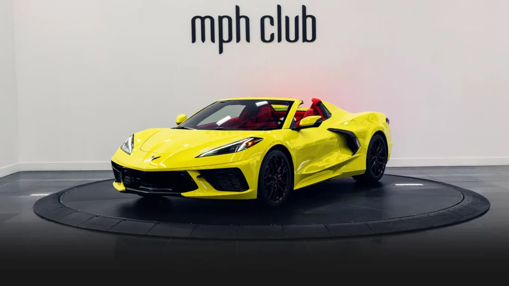 Yellow on red Chevrolet Corvette C8 rental profile view - mph club