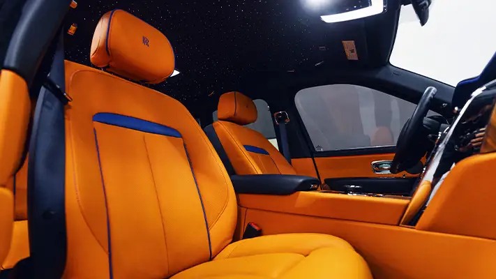 Blue Rolls Royce Cullinan rental interior view - mph club