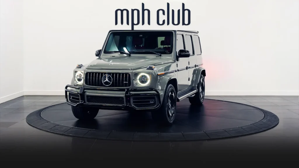 Gray Mercedes Benz G63 AMG G Wagon rental profile view - mph club