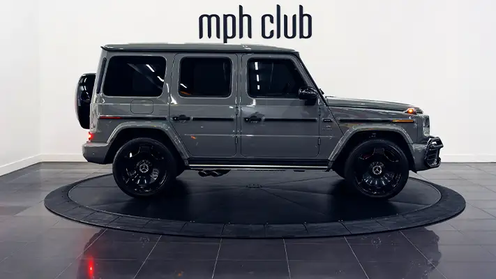 Gray Mercedes Benz G63 AMG G Wagon rental side view - mph club