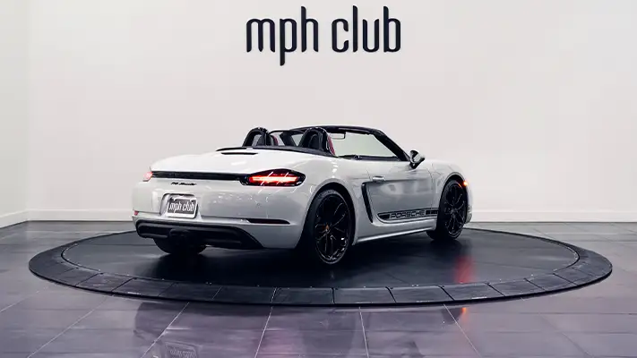 White Porsche 718 Boxster rental rear view - mph club