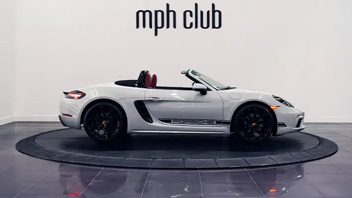 White Porsche 718 Boxster rental side view - mph club