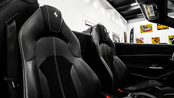 Black Ferrari F8 Spider rental interior view - mph club