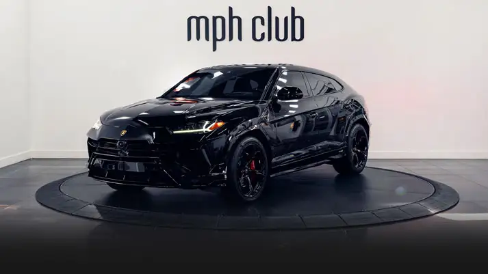 Black on red Lamborghini Urus rental profile view rszd - mph club