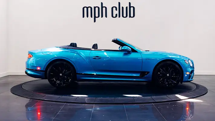 Blue Bentley Continental GTC Speed rental side view - mph club