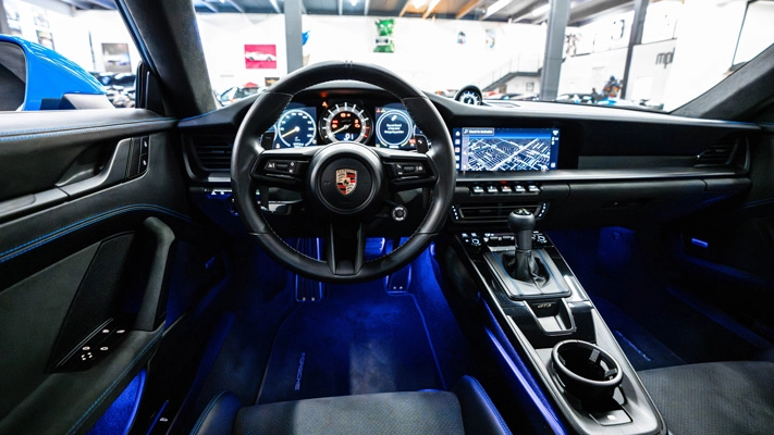 Blue Porsche 911 GT3 rental dashboard view - mph club