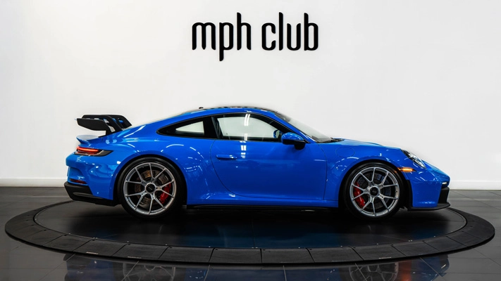 Blue Porsche 911 GT3 rental side view - mph club