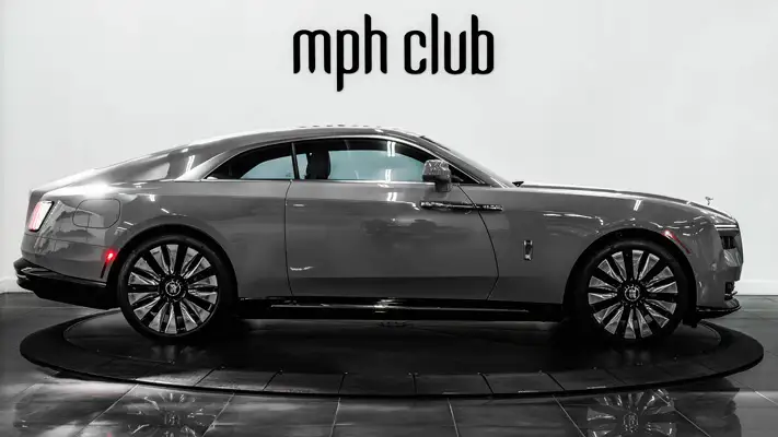 Grey on blue Rolls Royce Spectre rental side view - mph club