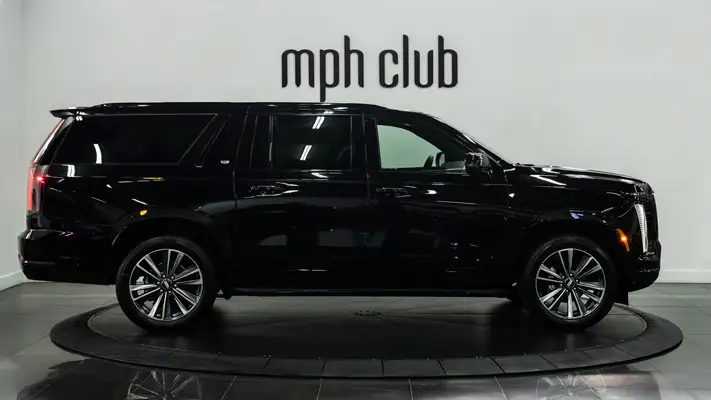 Black Cadillac Escalade ESV rental side view - mph club