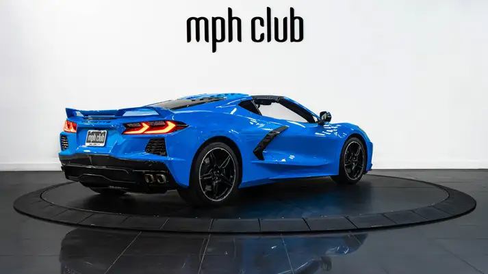 Blue on blue Chevrolet Corvette C8 rental rear view - mph club