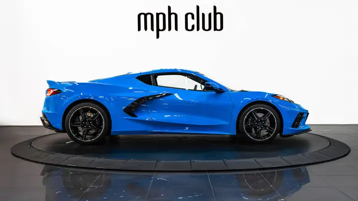 Blue on blue Chevrolet Corvette C8 rental side view - mph club