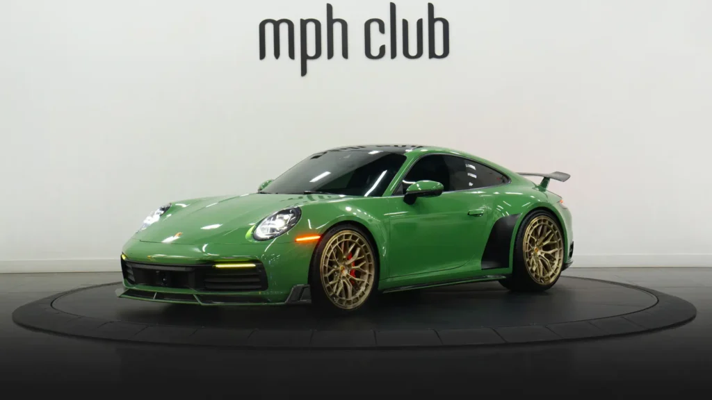 Green Porsche 911 Carrera T rental profile view - mph club