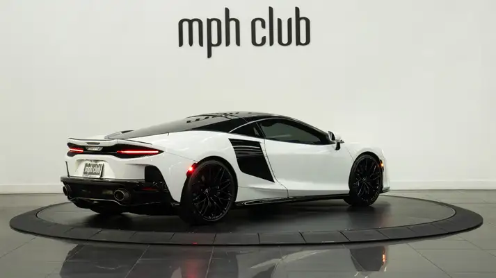 White McLaren GT rental rear view - mph club