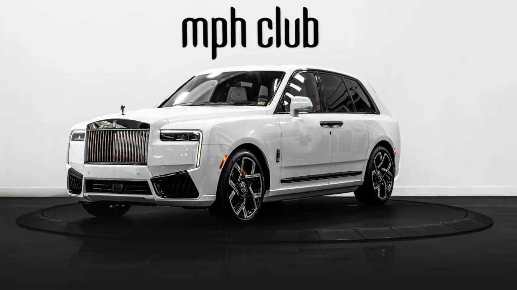 White on blue Rolls Royce Cullinan Black Badge for rent profile view - mph club