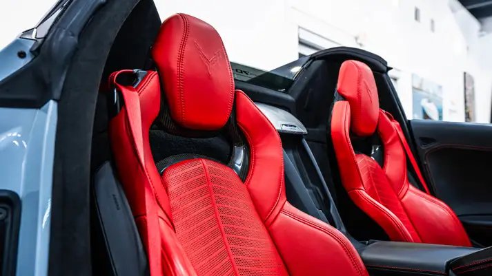 White on red Chevrolet Corvette C8 rental interior view - mph club