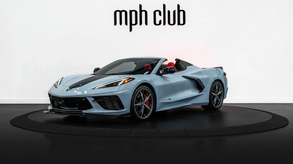 White on red Chevrolet Corvette C8 rental profile view - mph club