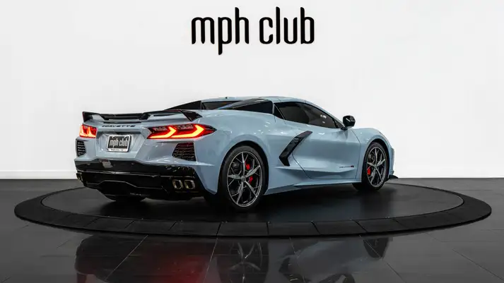 White on red Chevrolet Corvette C8 rental rear view - mph club