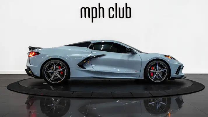 White on red Chevrolet Corvette C8 rental side view - mph club