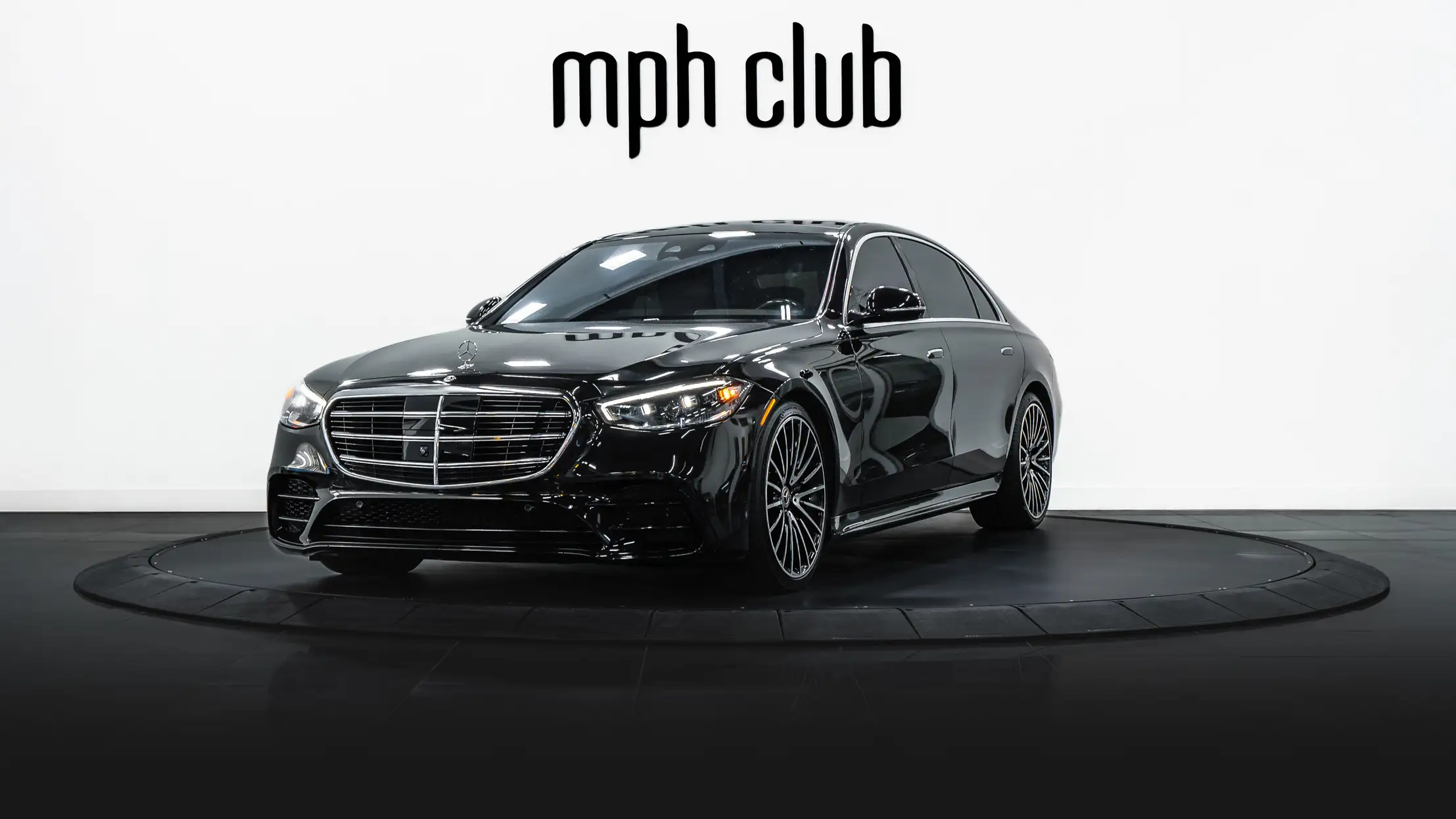 Black on red Mercedes Benz S Class 580 rental profile view - mph club