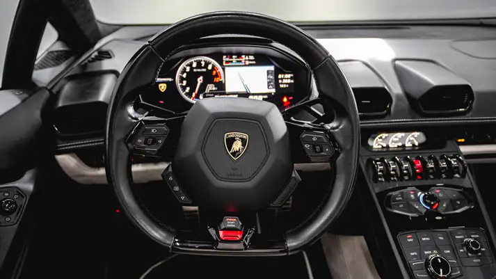 Black on white Lamborghini Huracan Evo Spyder rental dashboard view - mph club