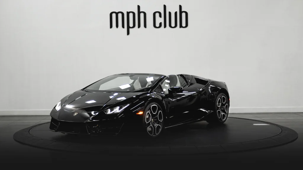 Black on white Lamborghini Huracan Evo Spyder rental profile view - mph club