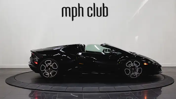 Black on white Lamborghini Huracan Evo Spyder rental side view - mph club