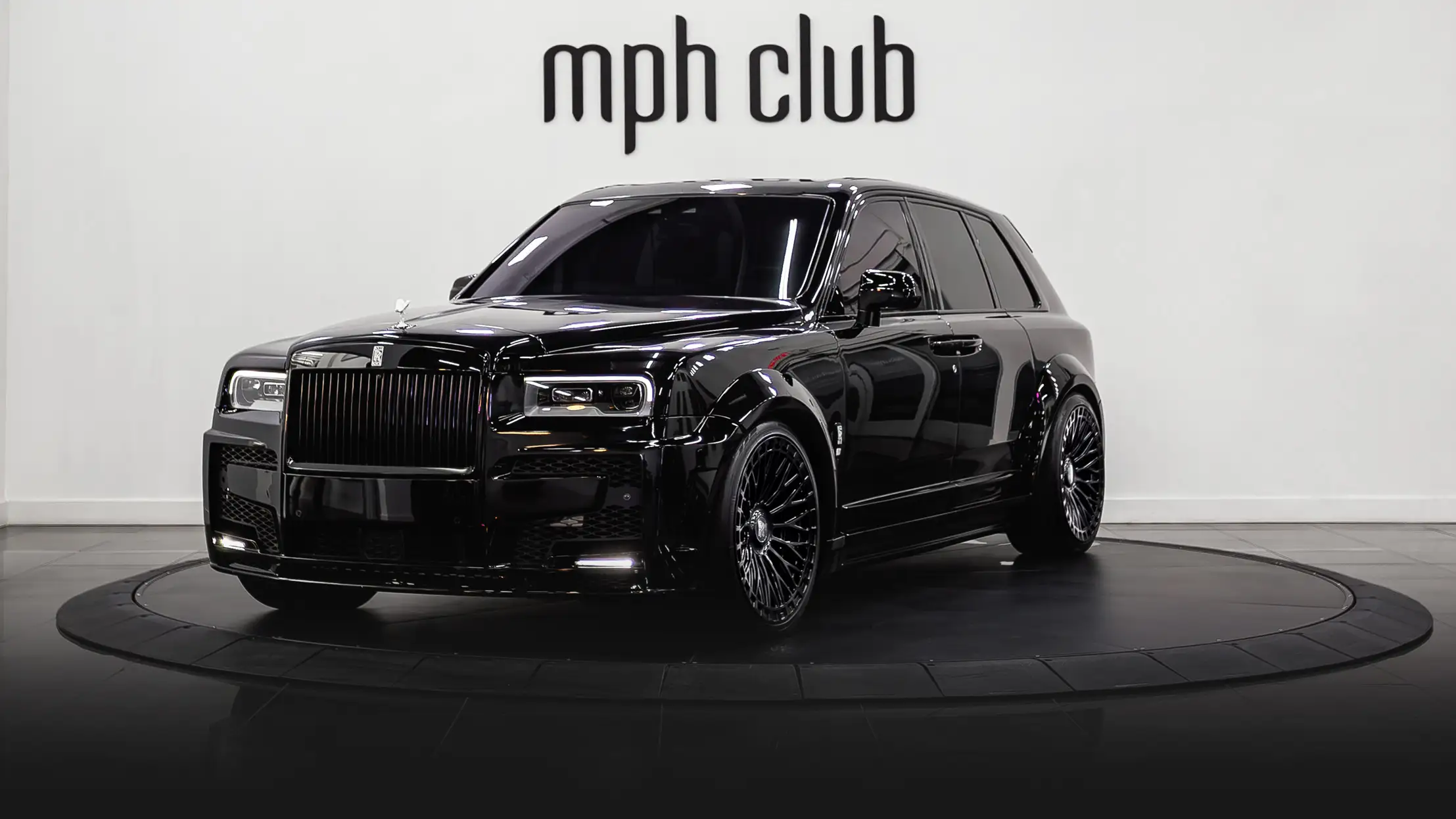 Black Rolls Royce Cullinan Widebody rental profile view - mph club