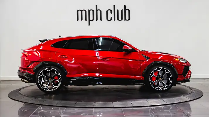 Red Lamborghini Urus Performante rental side view - mph club