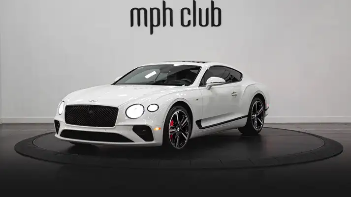 White on white Bentley GT rental profile view rszd - mph club