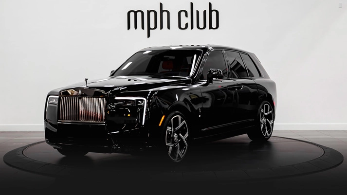 Black on orange interior Rolls Royce Cullinan Black Badge rental profile view rszd - mph club