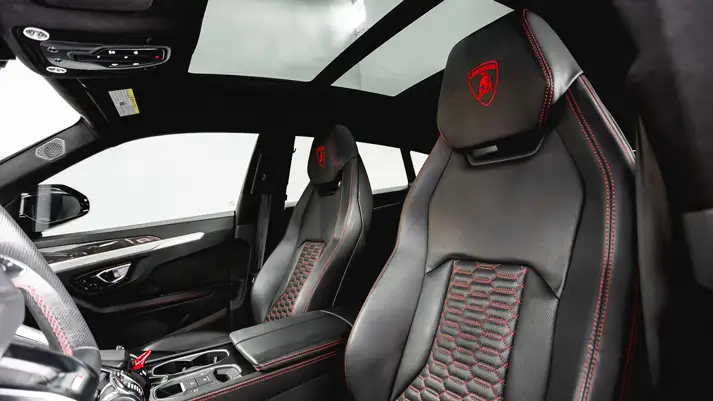 Black on black Lamborghini Urus rental interior view - mph club