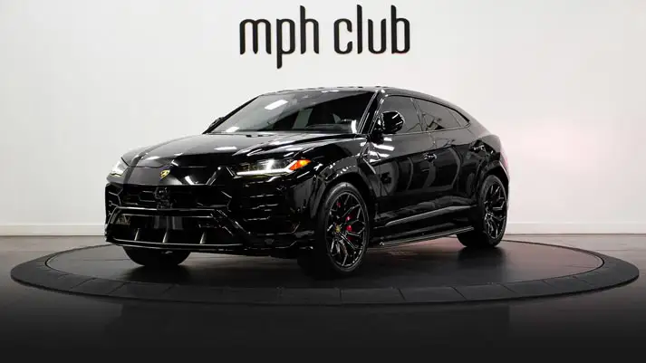 Black on black Lamborghini Urus rental profile view rszd - mph club