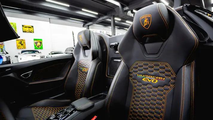 Blue Matte on black Lamborghini Huracan EVO Spyder rental interior view - mph club
