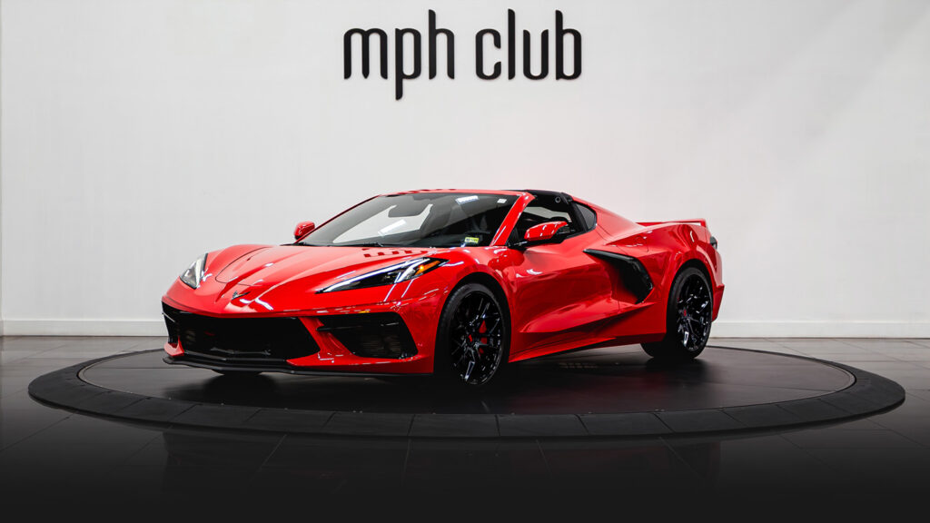 Red on black Chevrolet Corvette C8 rental profile view - mph club