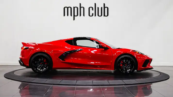 Red on black Chevrolet Corvette C8 rental side view - mph club
