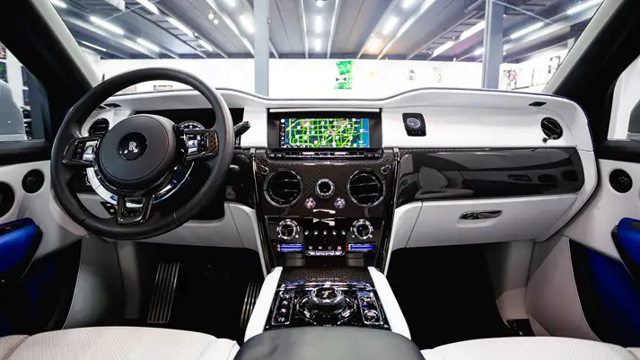 White on blue Rolls Royce Cullinan Black Badge rental dashboard view - mph club