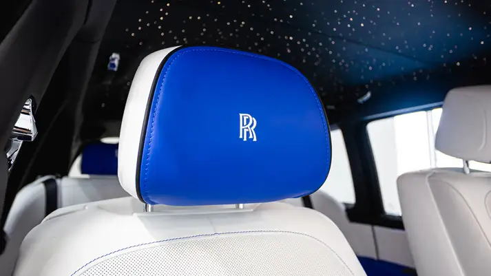 White on blue Rolls Royce Cullinan Black Badge rental interior view - mph club